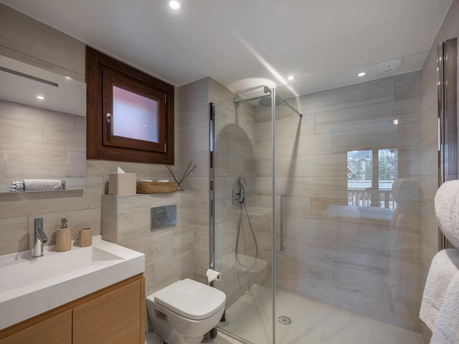 Bathroom with walk-in shower and vanity