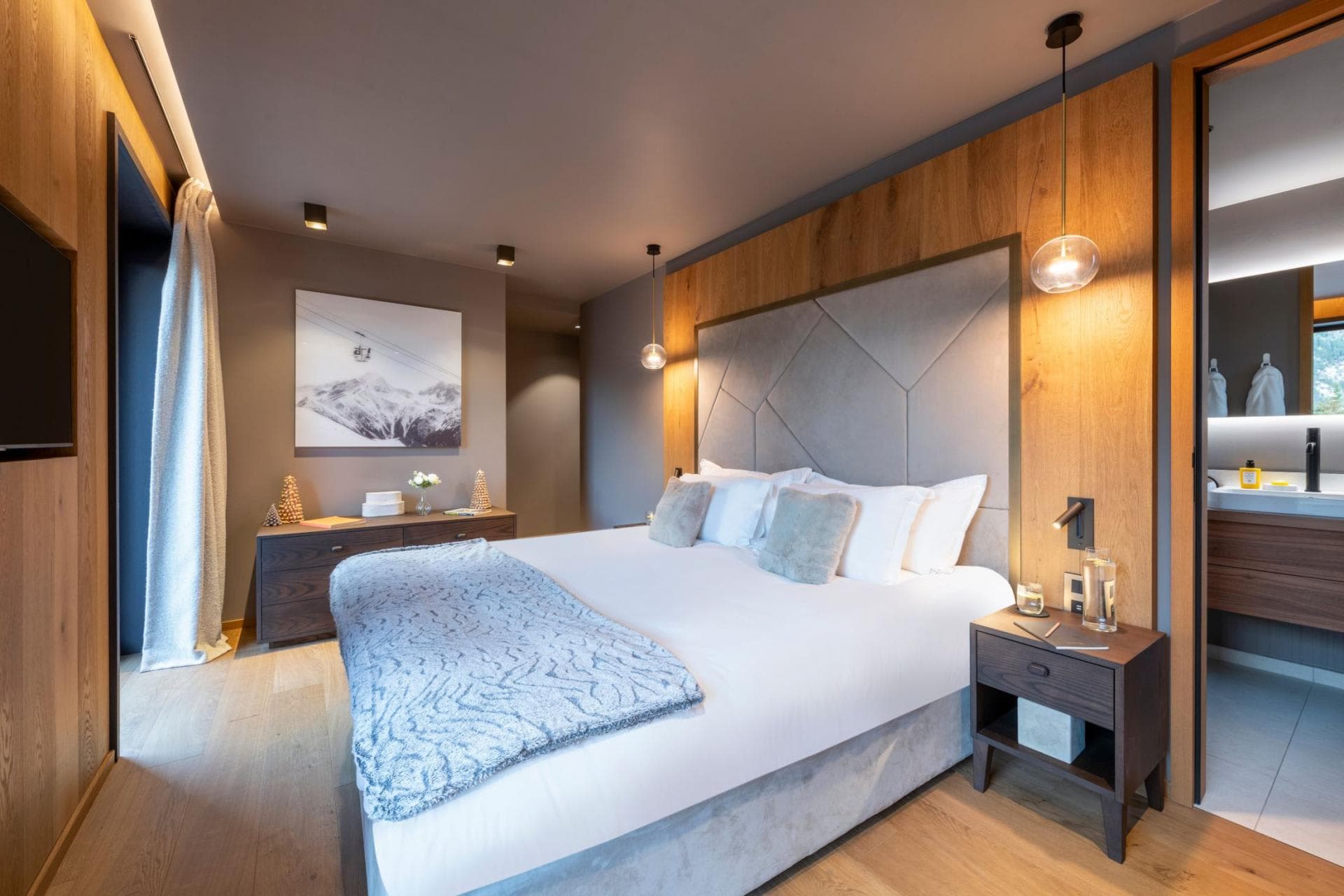 Primary bedroom with king bed and ensuite bathroom access