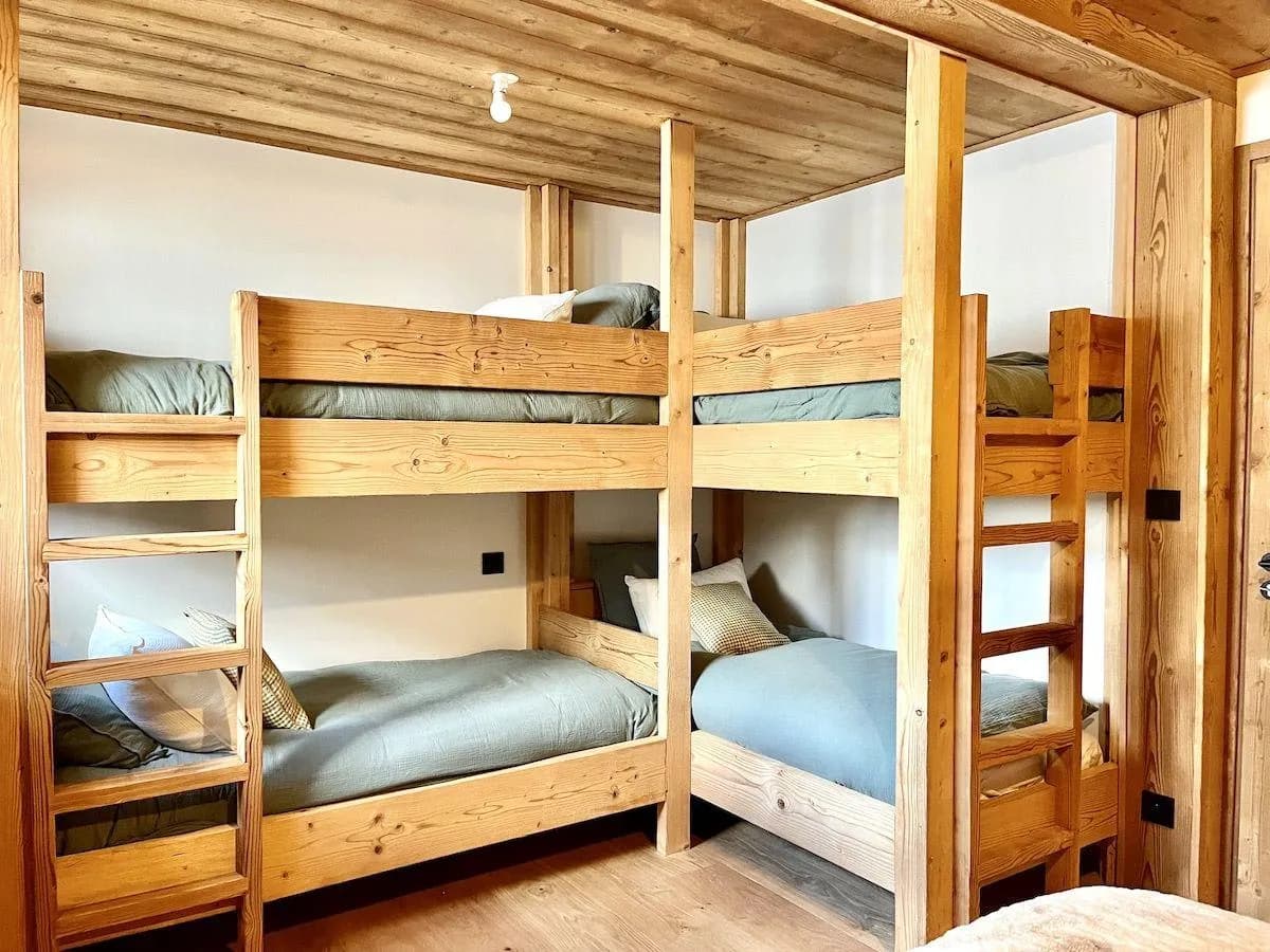 Family room with custom-built timber bunk beds and integrated ladders