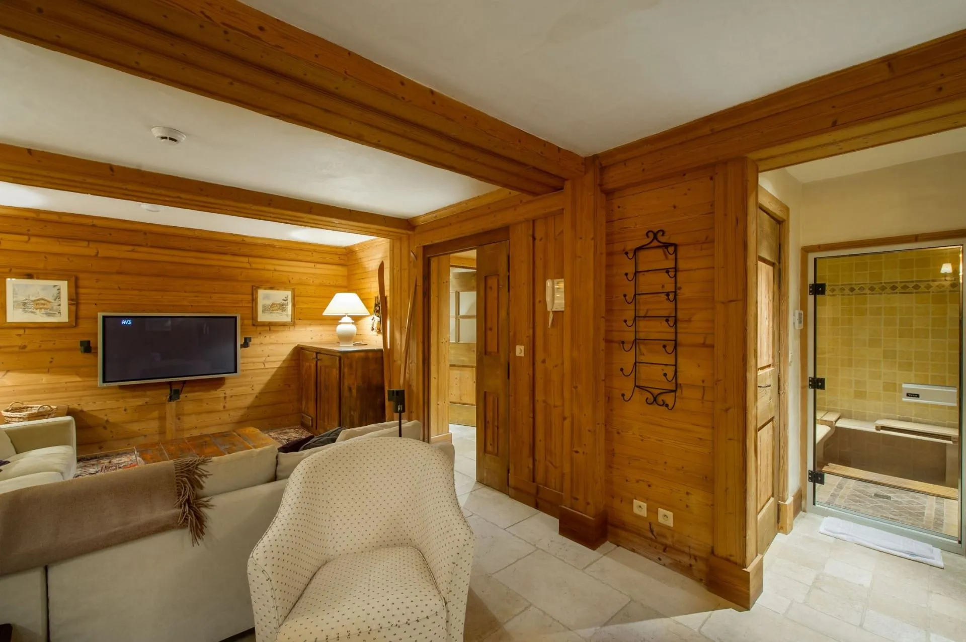 Television lounge beside the lower-level spa facilities