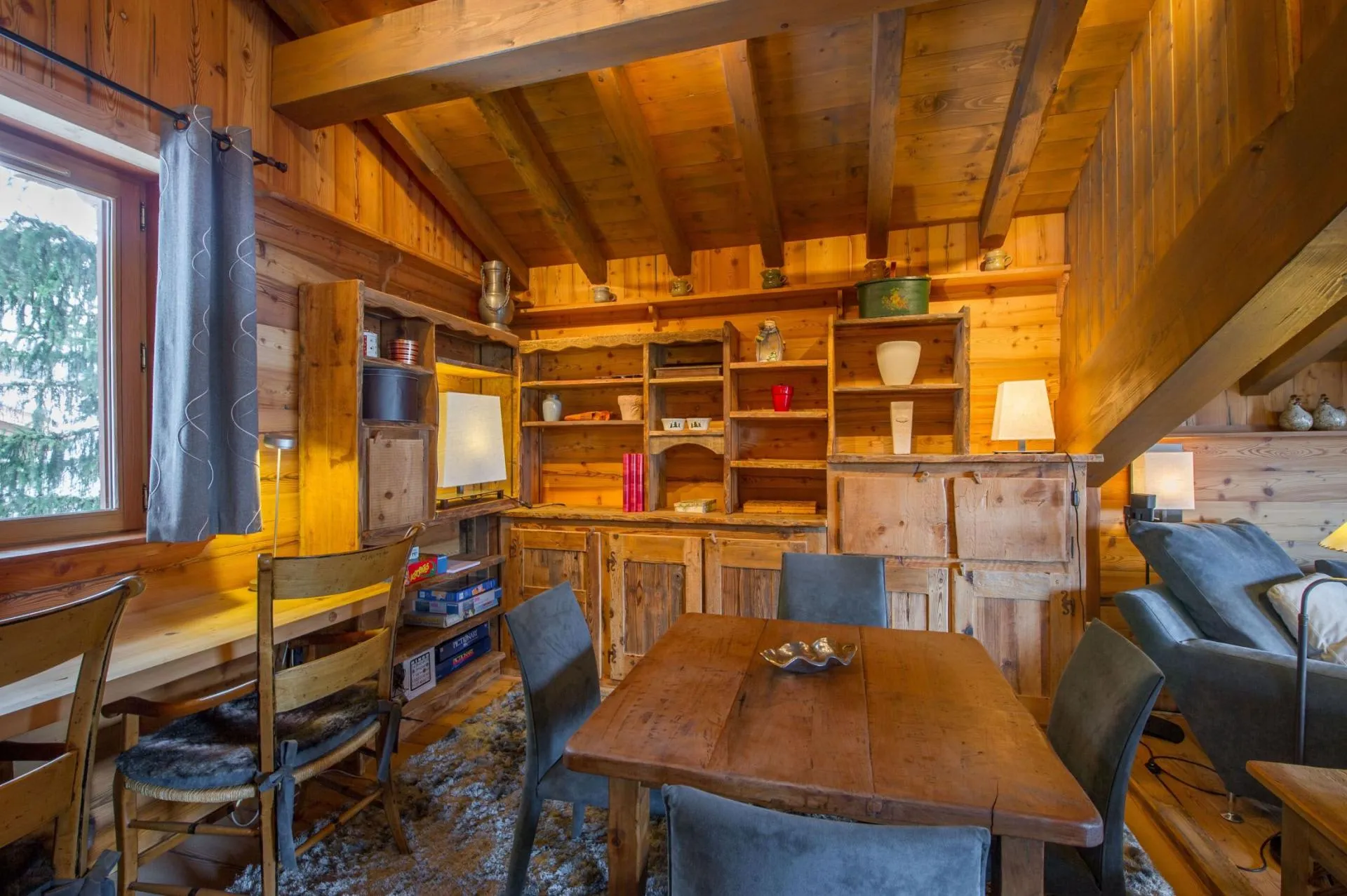 Open kitchen with timber cabinetry and breakfast table