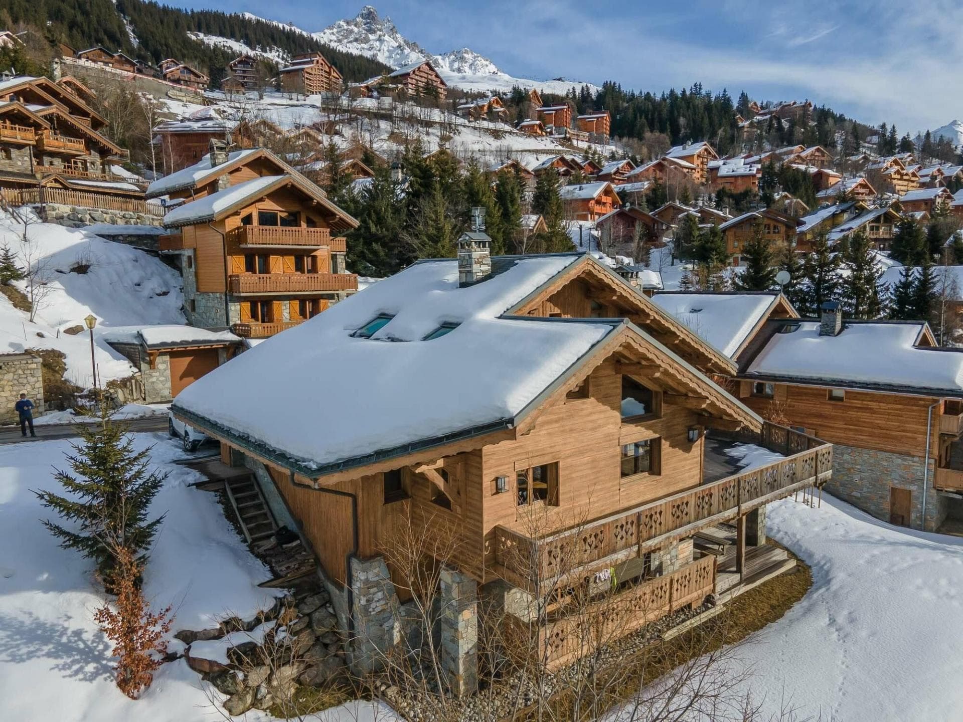 Ski-in chalet with wrap-around balcony and private driveway parking