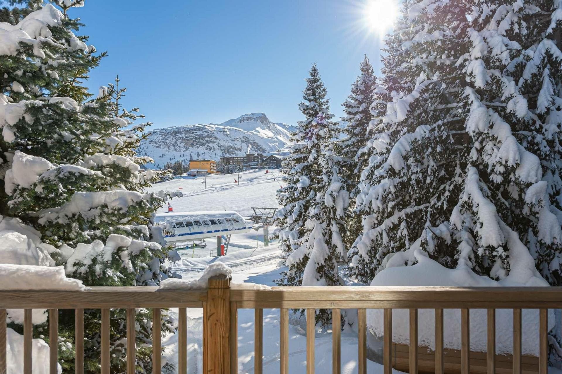 Private balcony with direct views of the ski lift and slopes