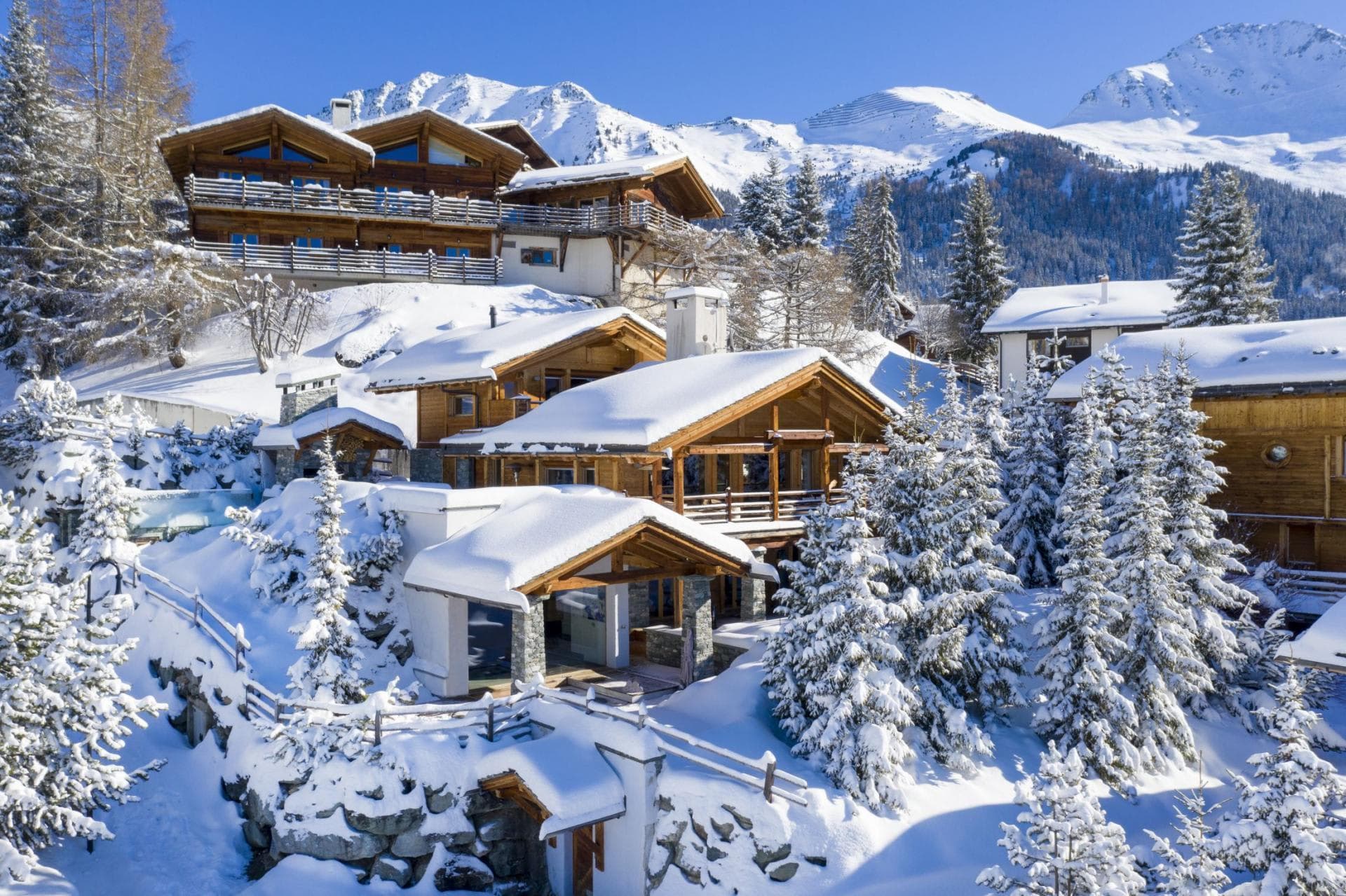 Ski-in, ski-out timber chalets with private balconies and mountain views