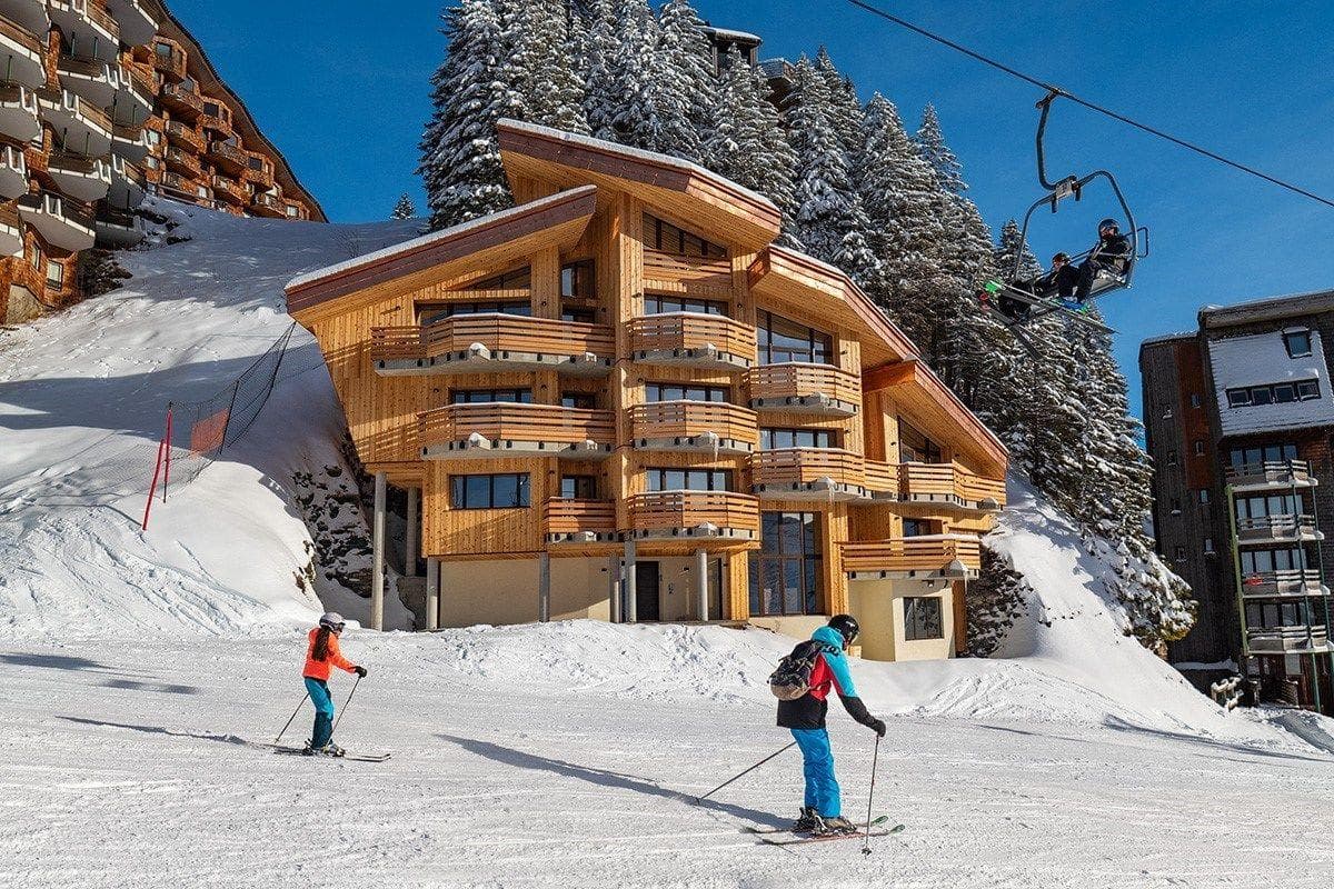 Ski-in/ski-out chalet exterior located directly on the piste with chairlift access