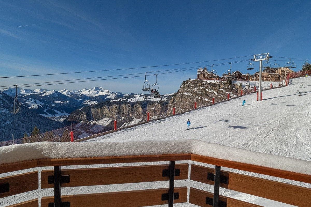Private balcony with direct ski-in/ski-out access and chairlift views