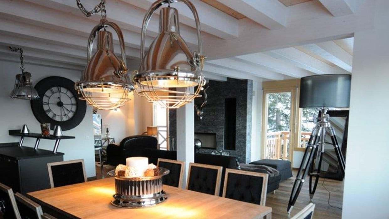 Dining area with seating for 8 and adjacent balcony access