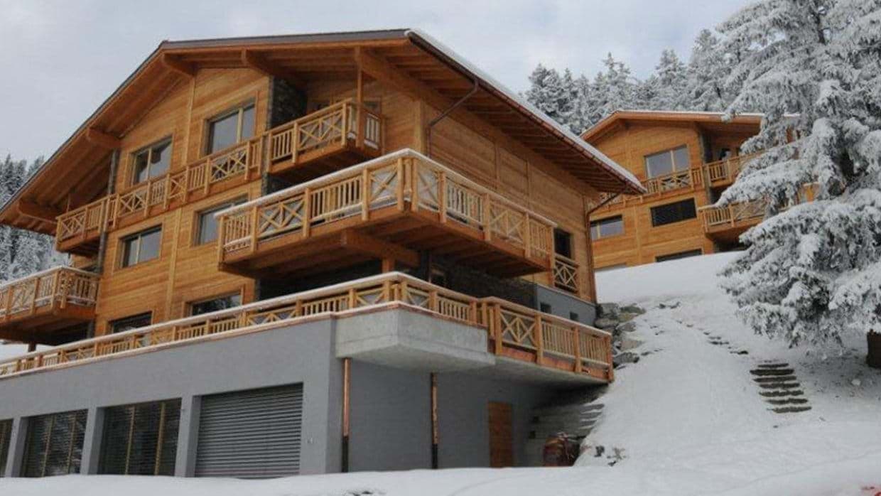 Ski-in/ski-out chalet with multiple private balconies and garage access