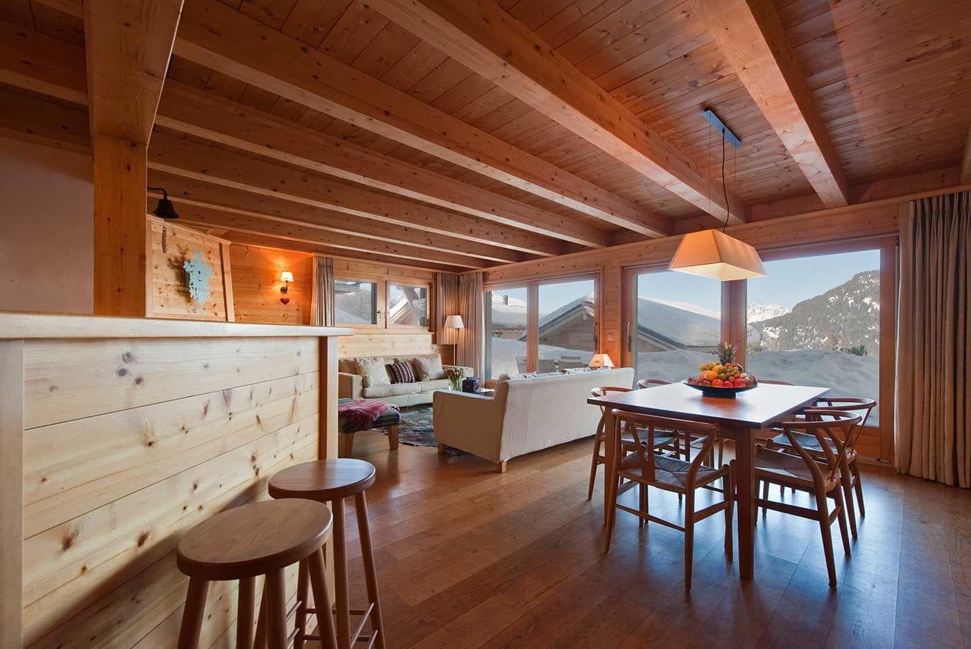 Open-plan living area with dining for 6 and mountain views