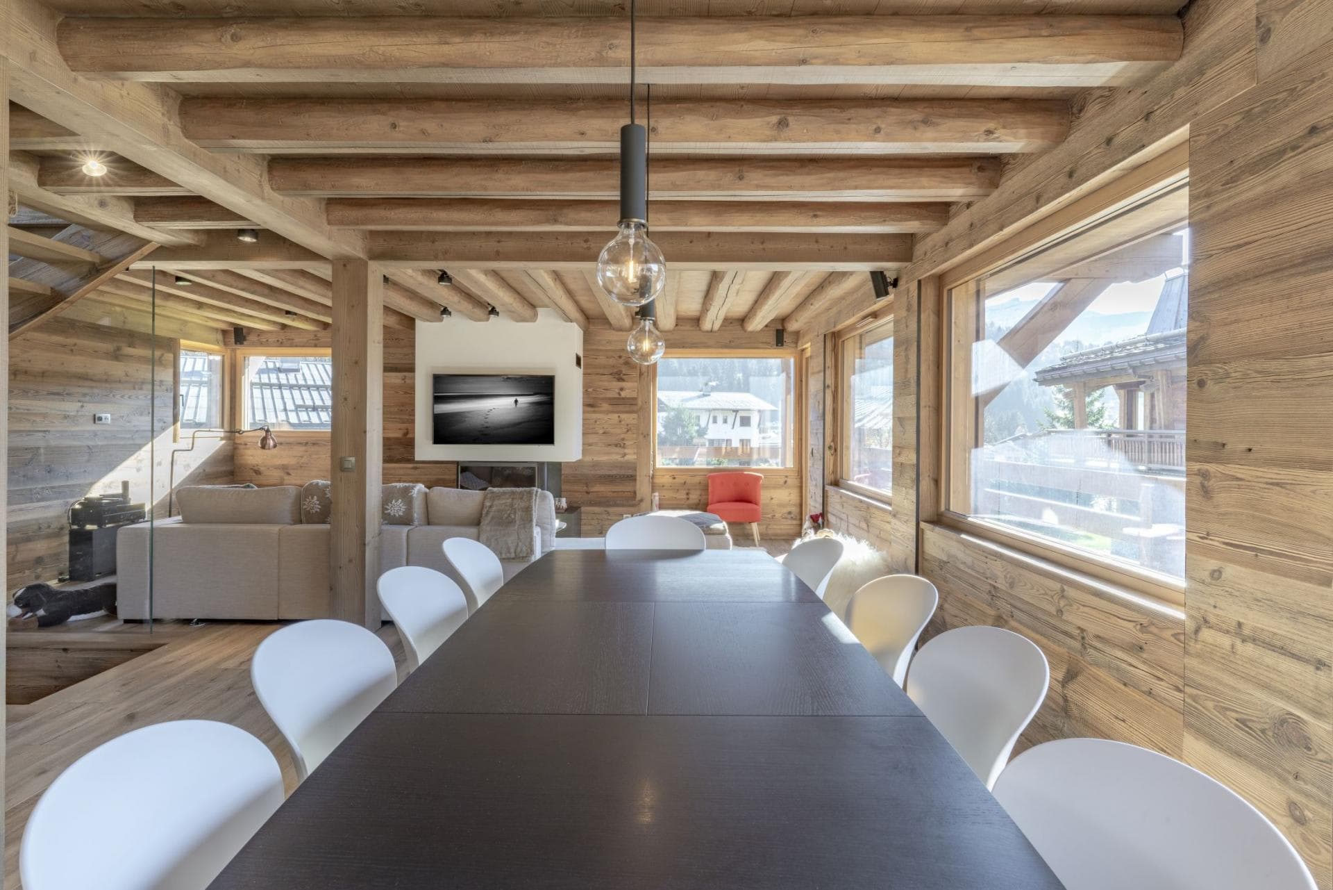 Dining area with seating for 10; adjacent to open-plan living room