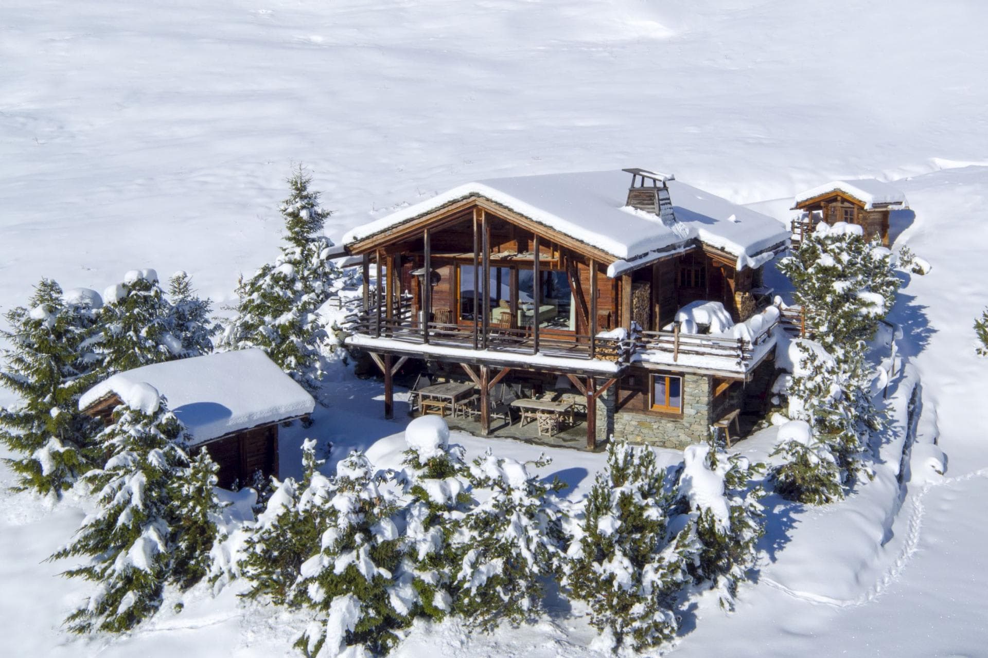 Ski-in/ski-out chalet with wrap-around balcony and covered outdoor terrace