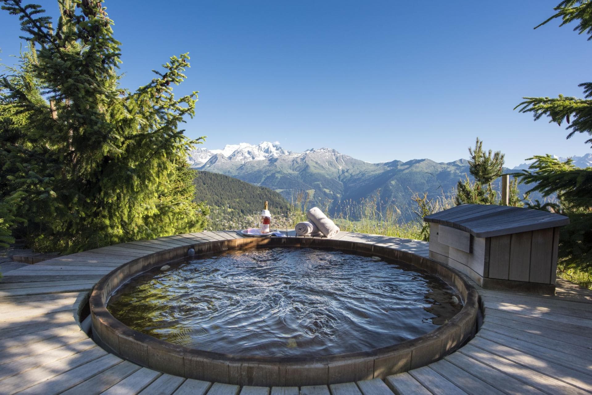 Cedar hot tub on sun deck with panoramic Alpine views