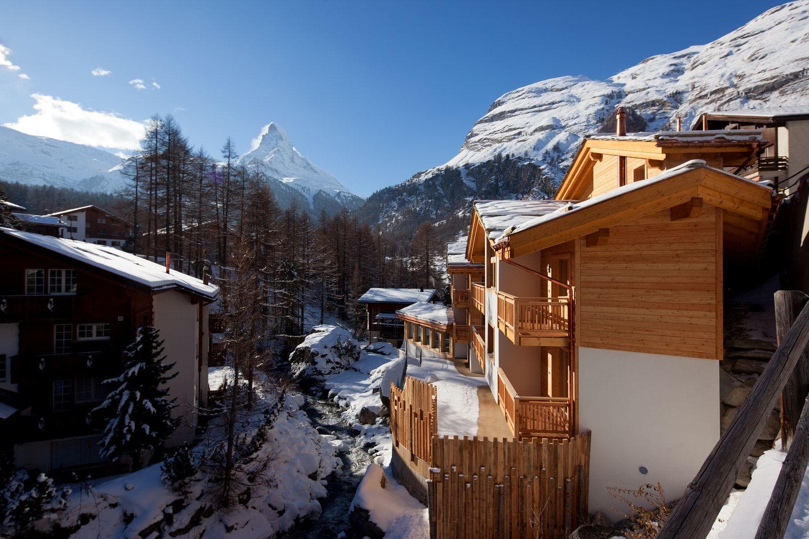 Riverside chalets with private balconies and Matterhorn views