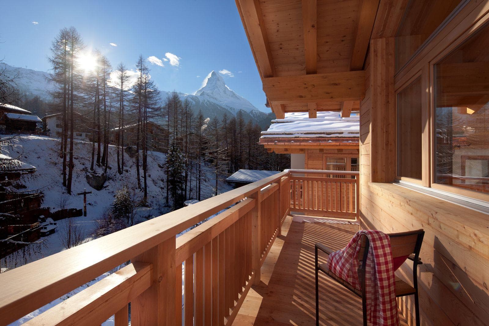 Covered wooden balcony with direct views of the Matterhorn peak