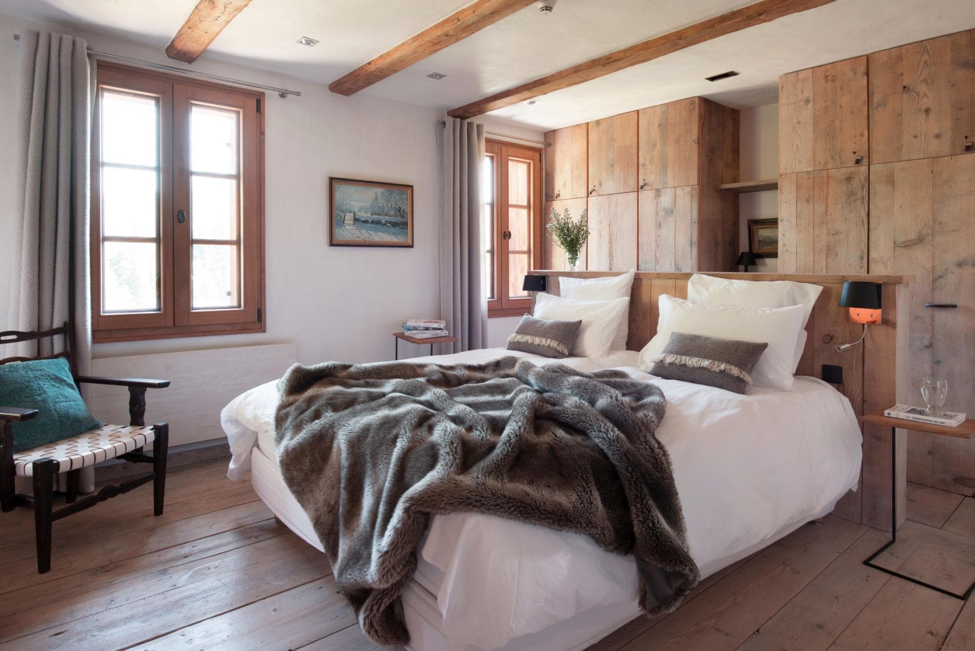 Bedroom with king bed and built-in wood wardrobe storage