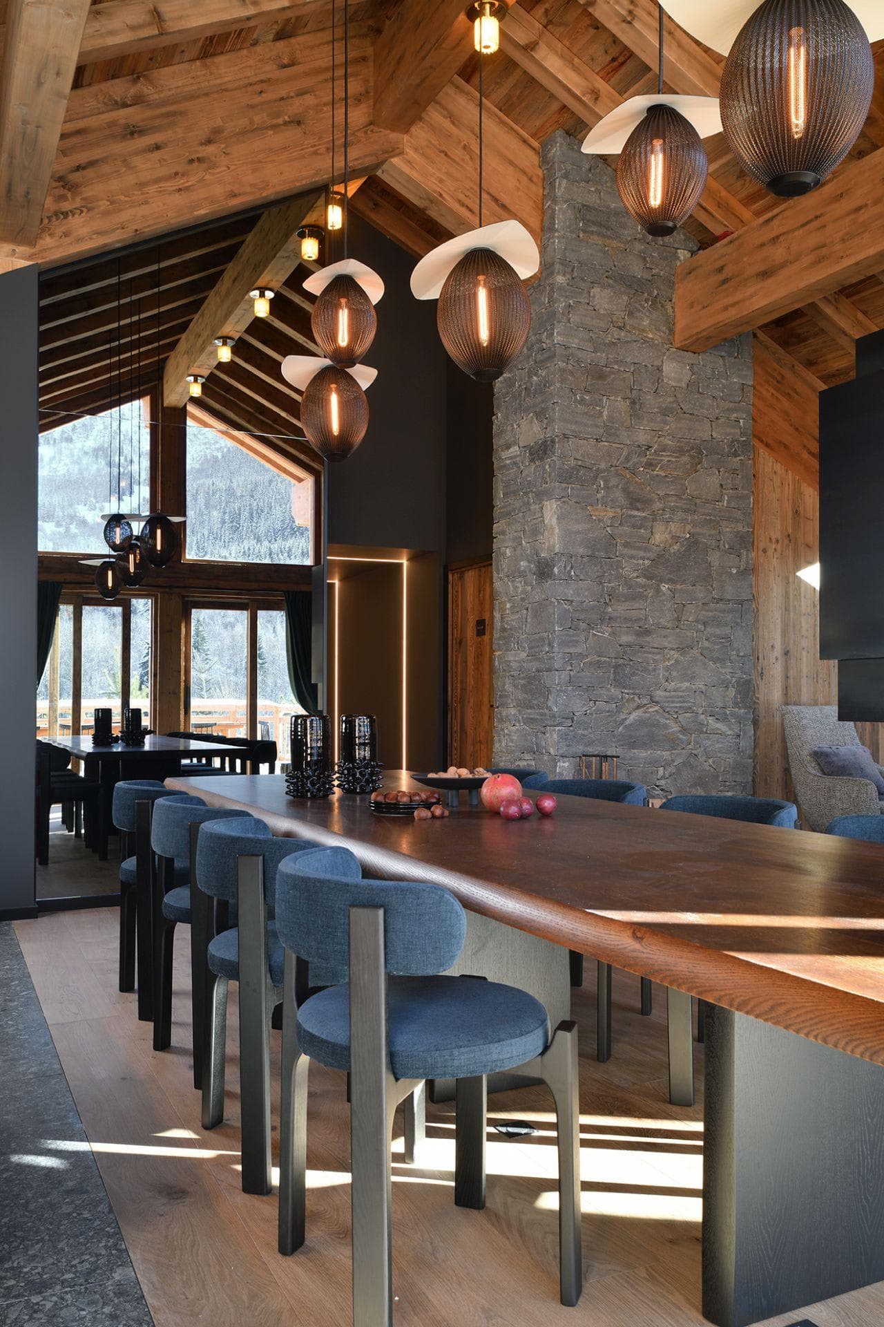 Dining island seats 8; pendant lighting and stone fireplace