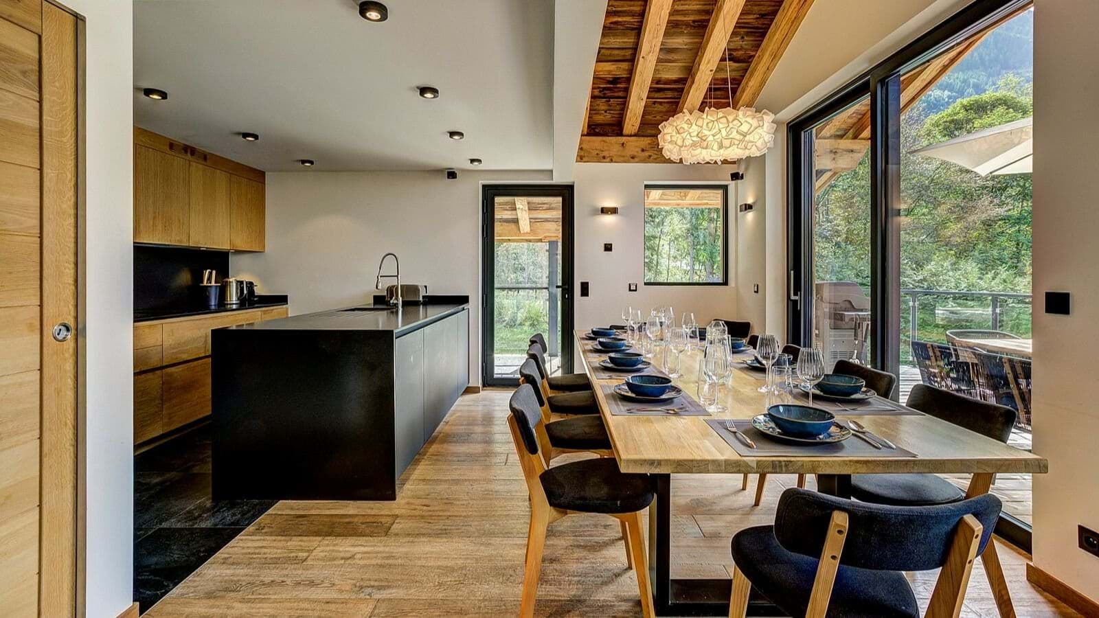 Open-plan dining area with seating for 10 and patio access