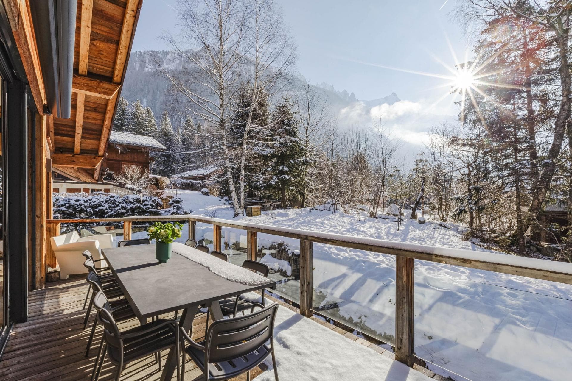 Deck dining area seats 4; snow-covered valley and mountain views