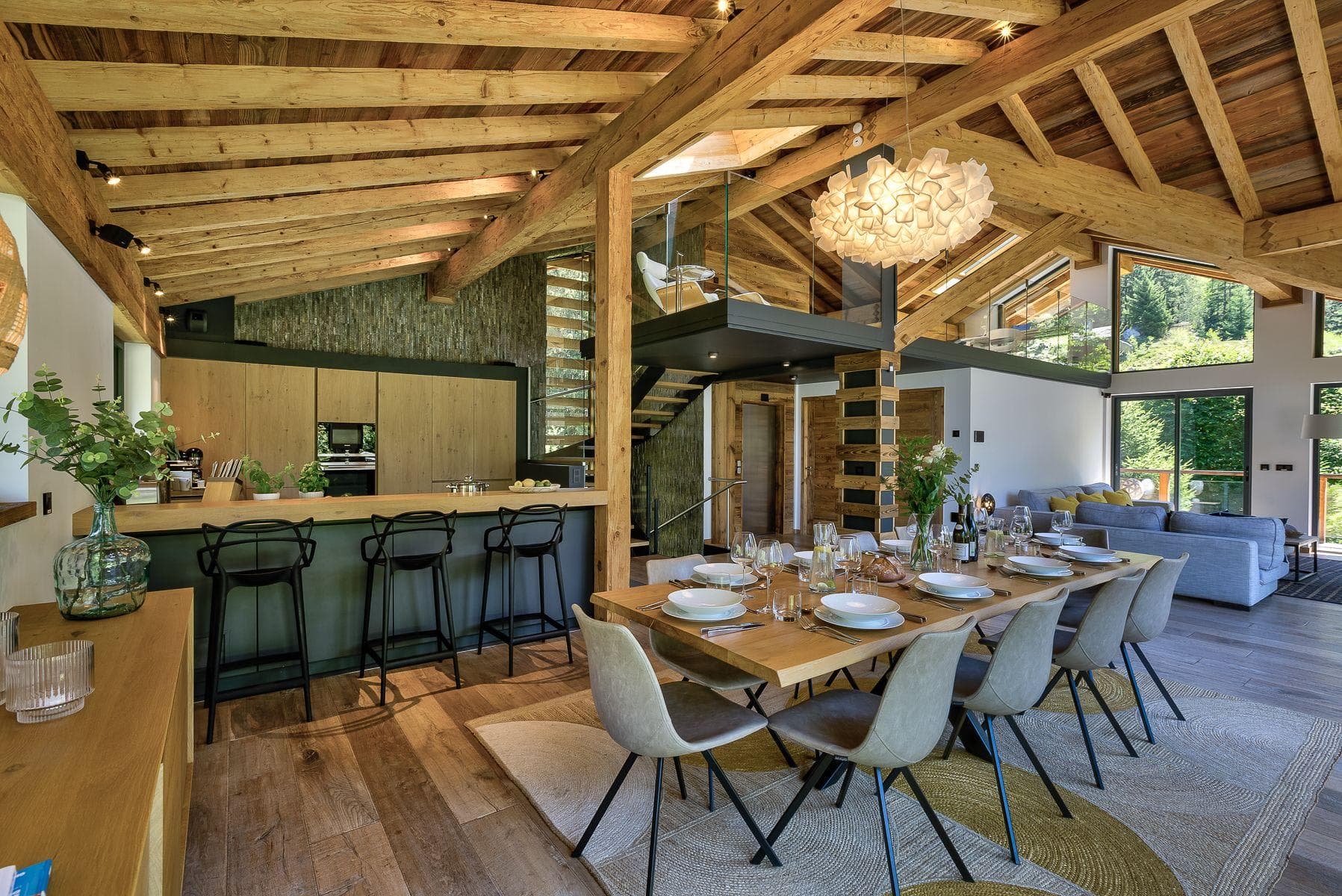 Open-plan dining area seats 10; adjacent kitchen and mezzanine lounge