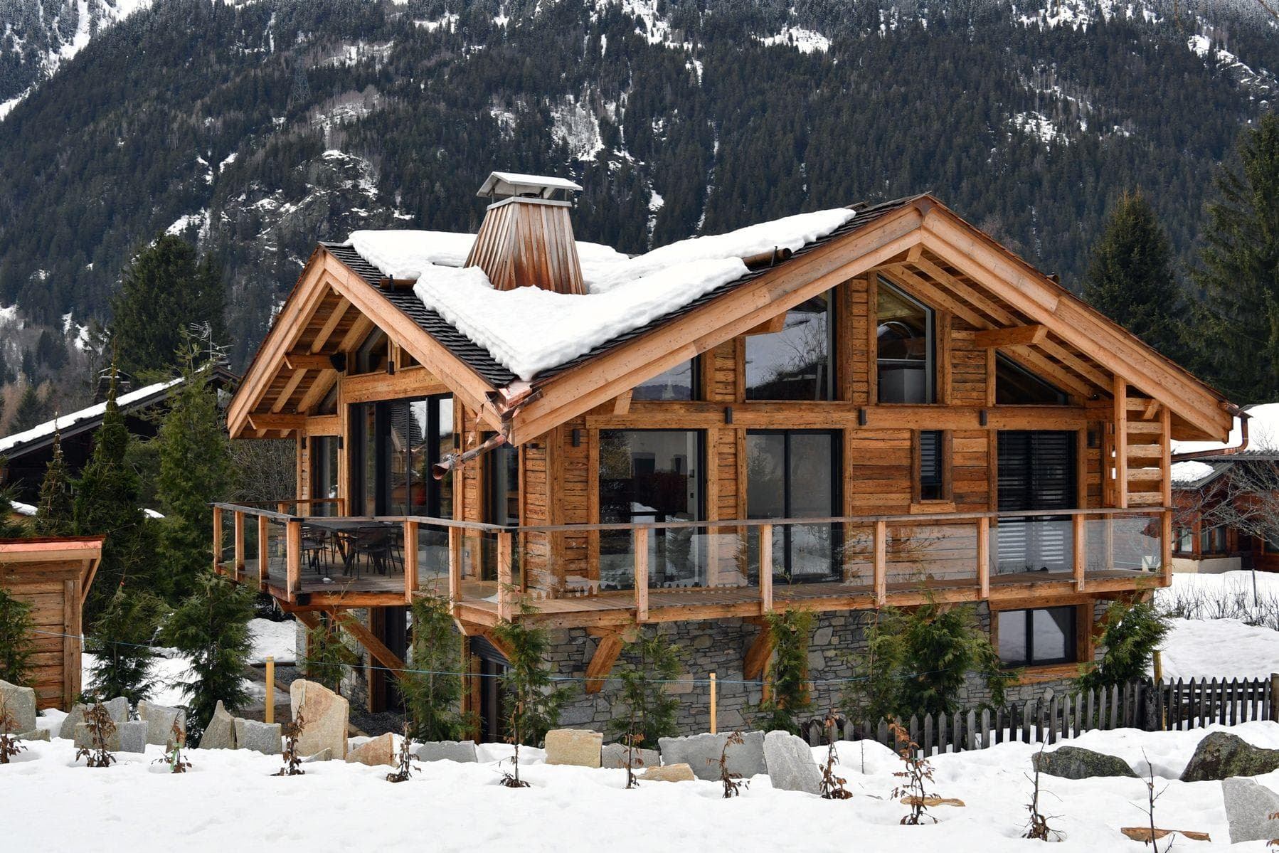 Ski-in chalet with wrap-around balcony and mountain views