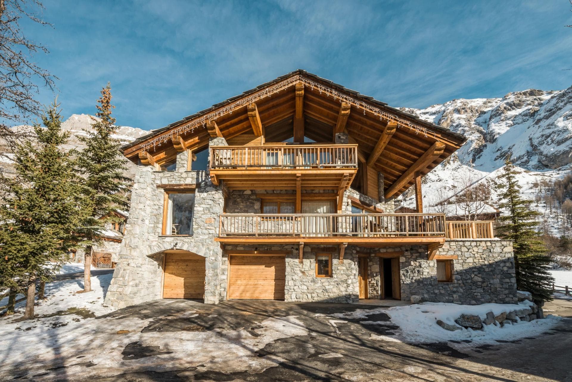 Ski-in chalet with heated two-car garage and mountain views