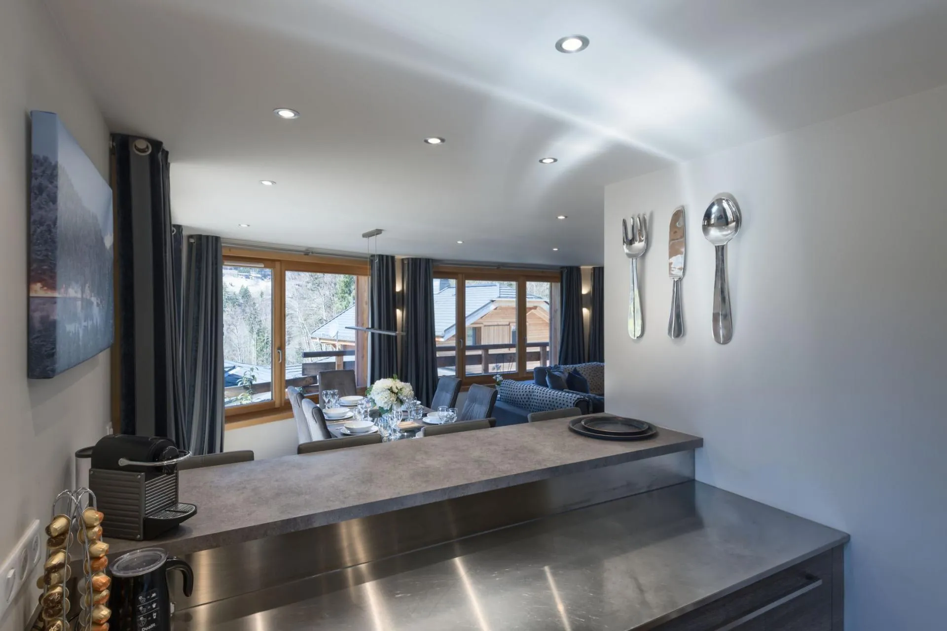 Kitchen counter with Nespresso machine; dining for 6 with mountain views