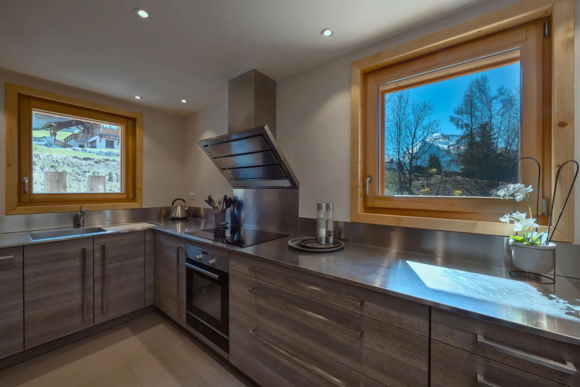 Kitchen with stainless steel countertops and mountain views