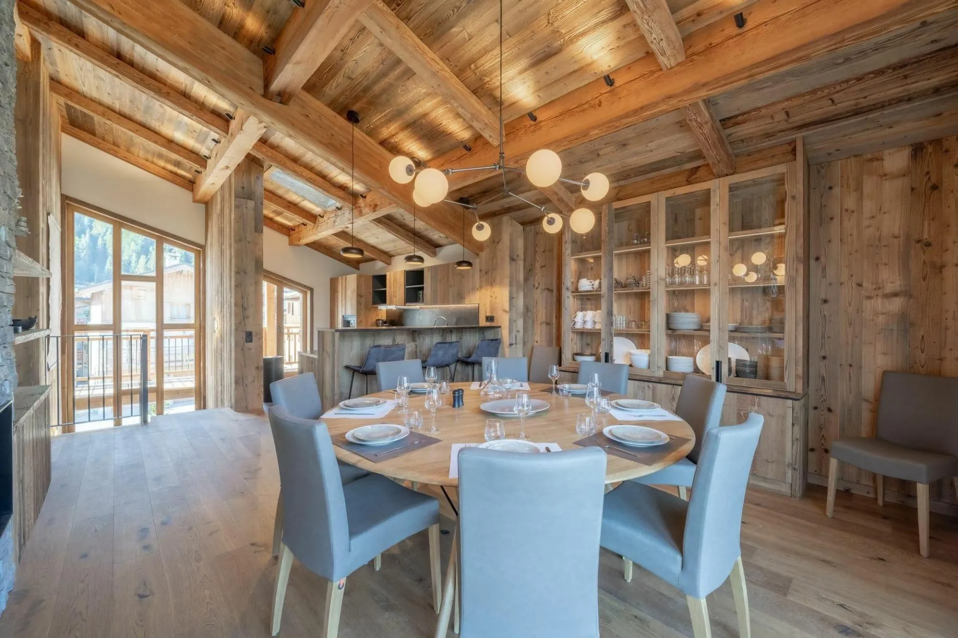Dining area beneath exposed timber beams