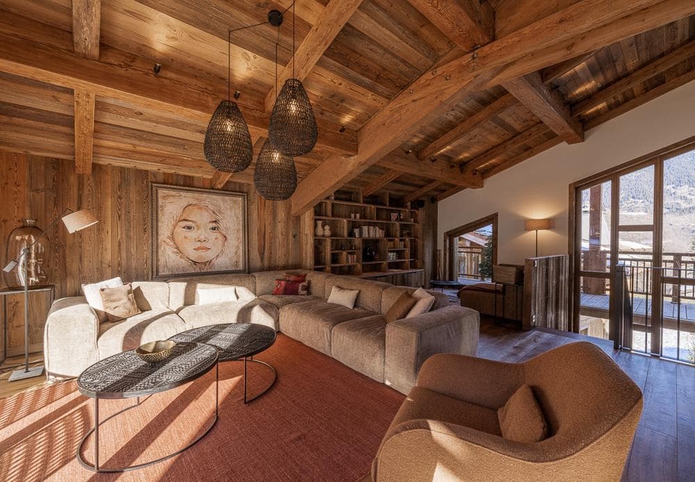 Living area with sectional seating for 8 and vaulted timber ceilings