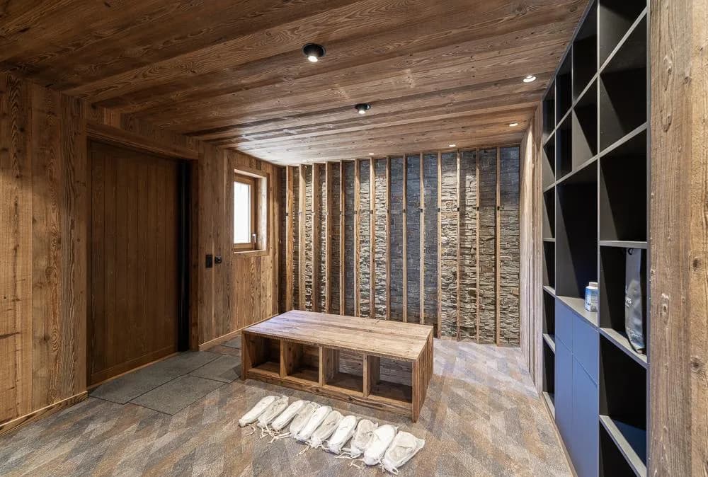 Ski room with storage cubbies and bench seating