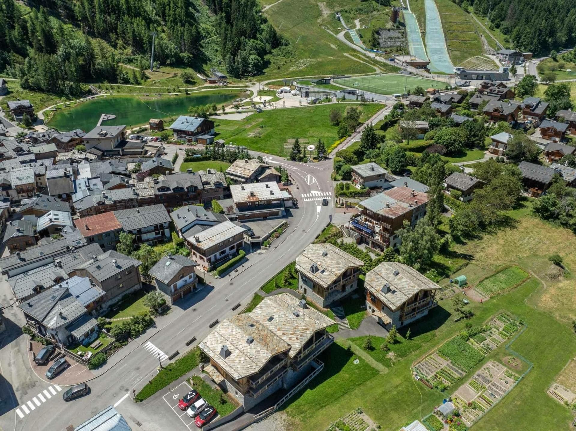 Aerial view of village center; walking distance to lake and ski jumps
