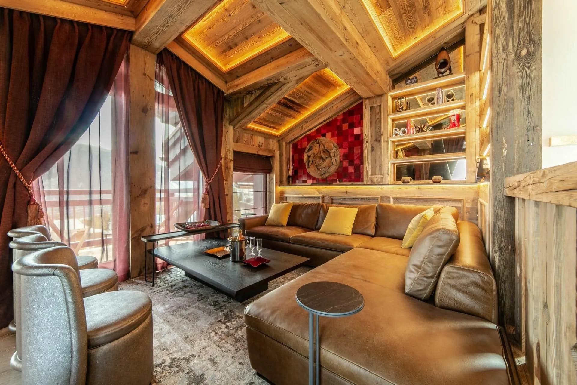 Top-floor living room with suspended fireplace and large windows