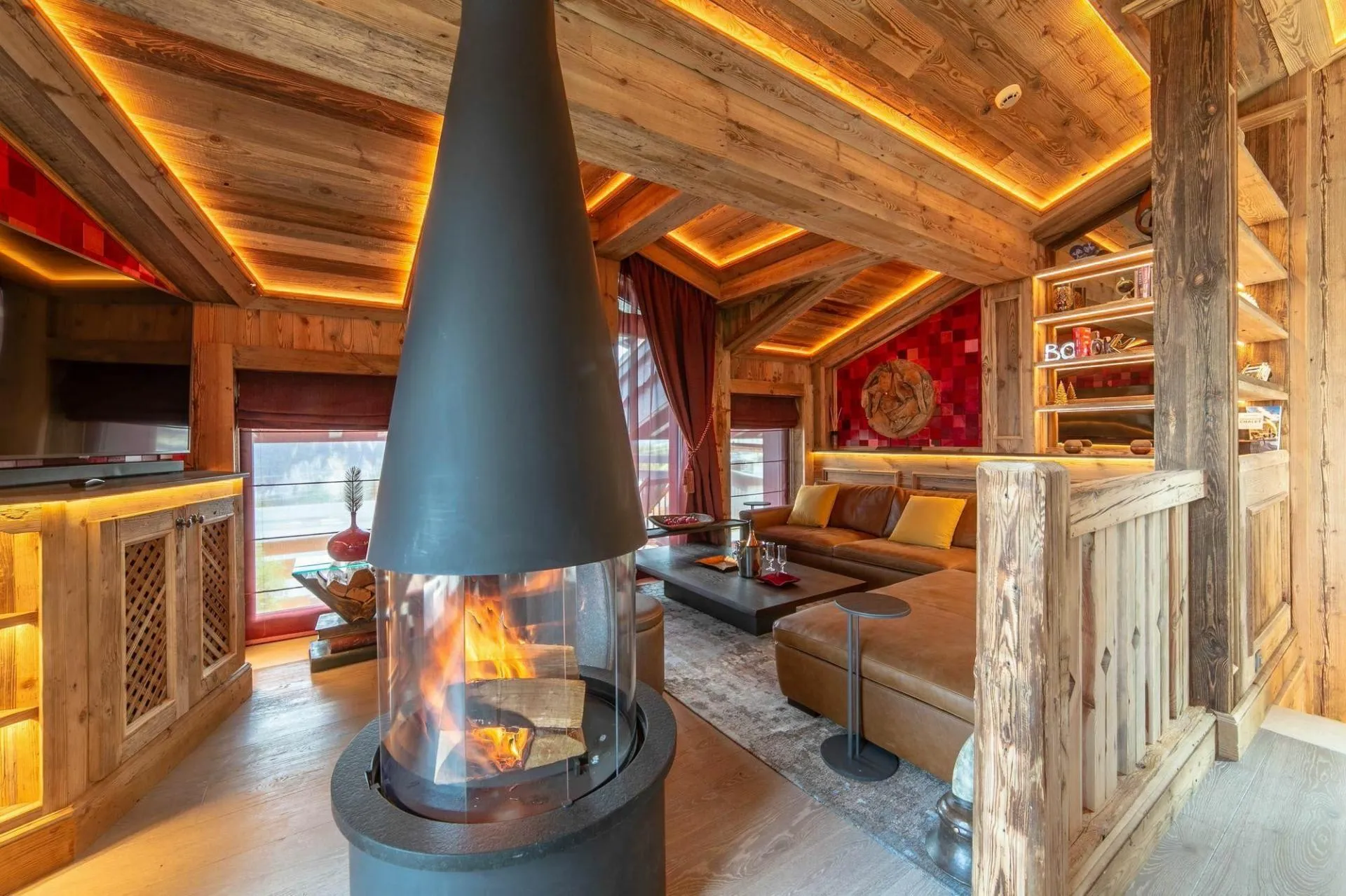 Central suspended wood fireplace in the living room
