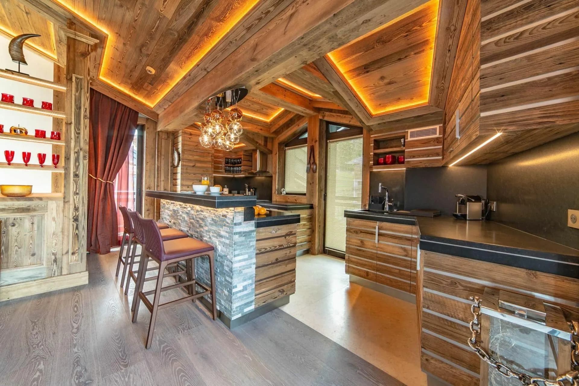 Professional kitchen with timber cabinetry and island seating