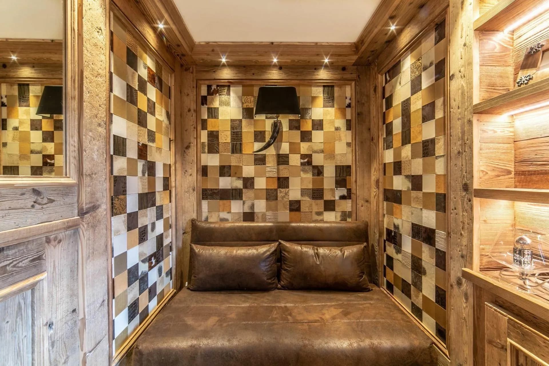 Upholstered reading nook with patterned wall panels