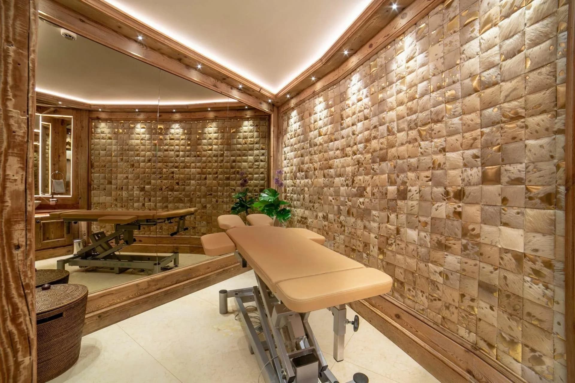 Massage room with treatment table and seating