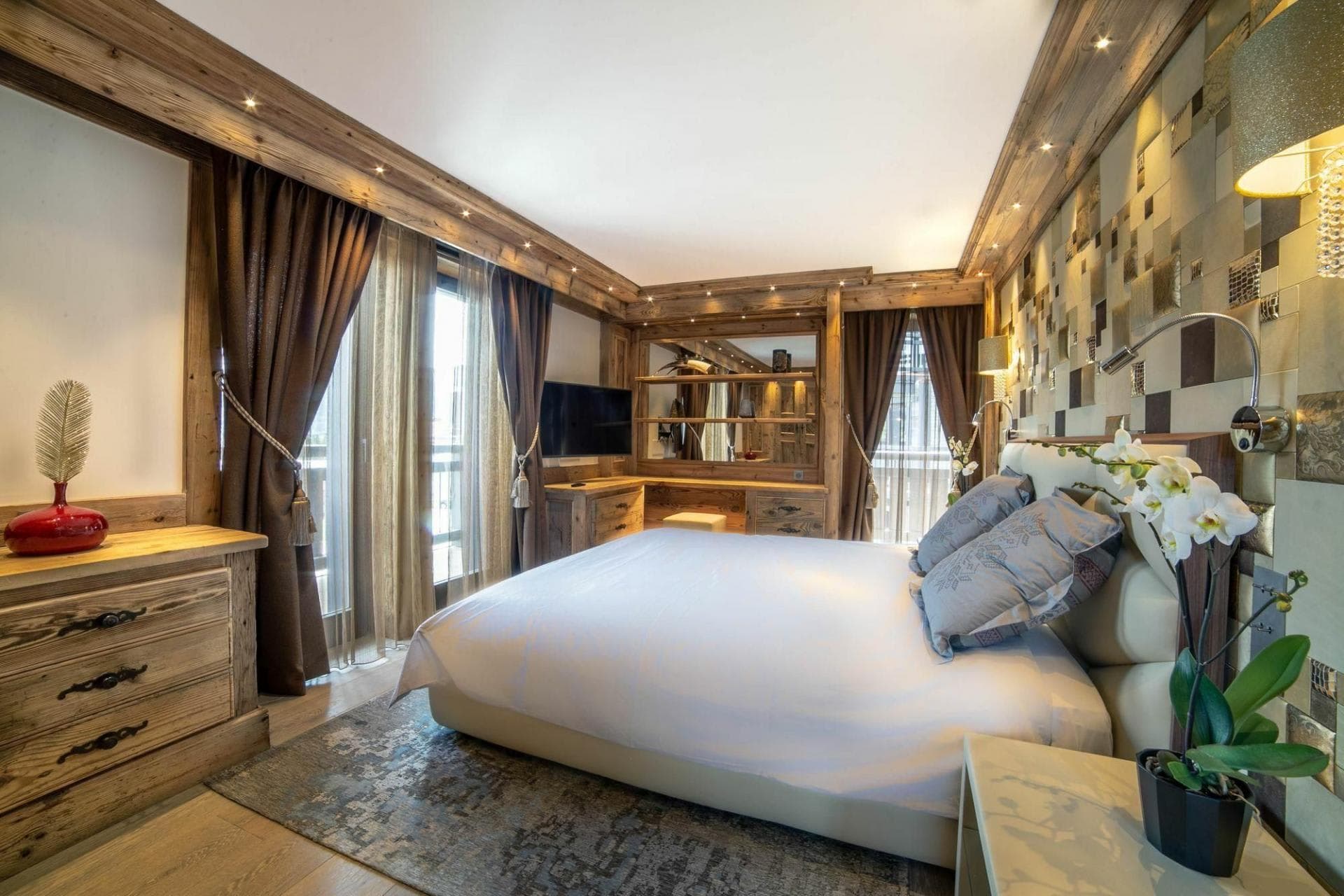 Primary bedroom with king bed and built-in vanity desk