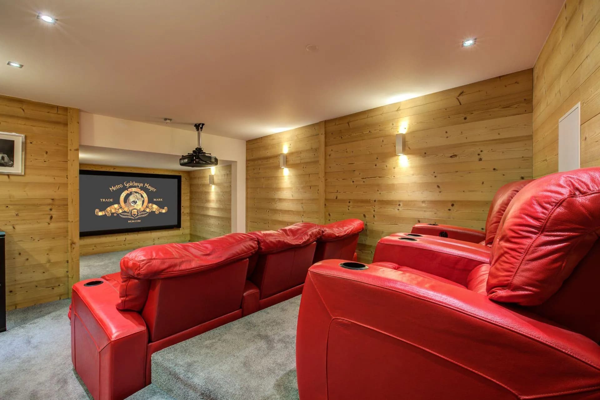 Private cinema with projector and reclining seats