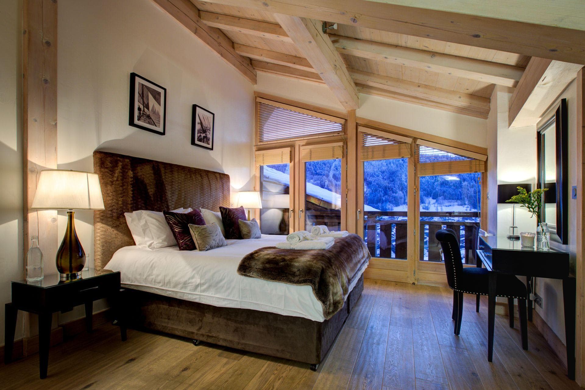 Master suite with double bed and mountain views