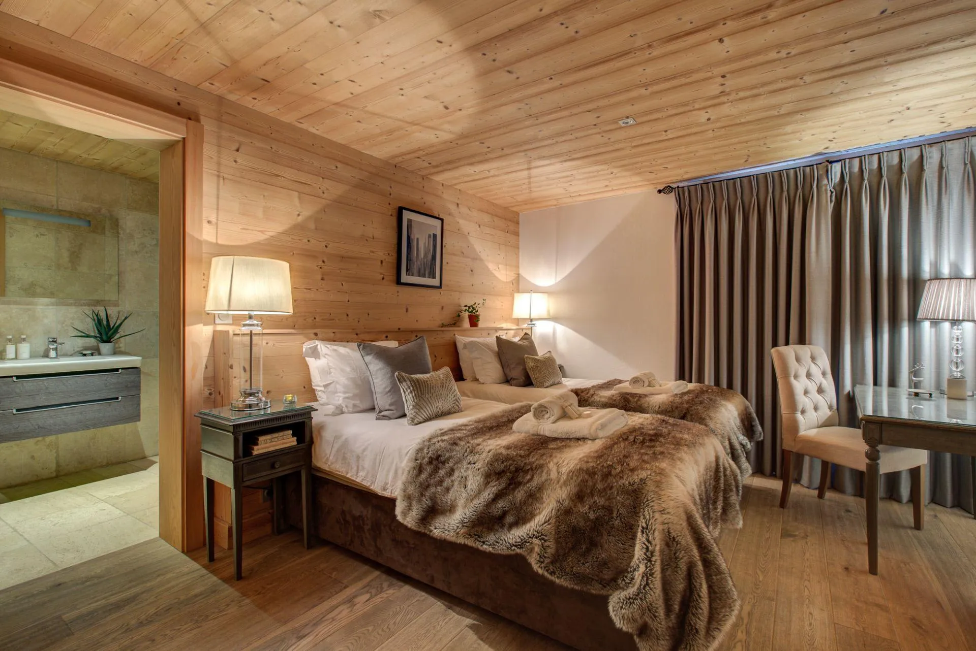 Twin bedroom with desk and en-suite bathroom