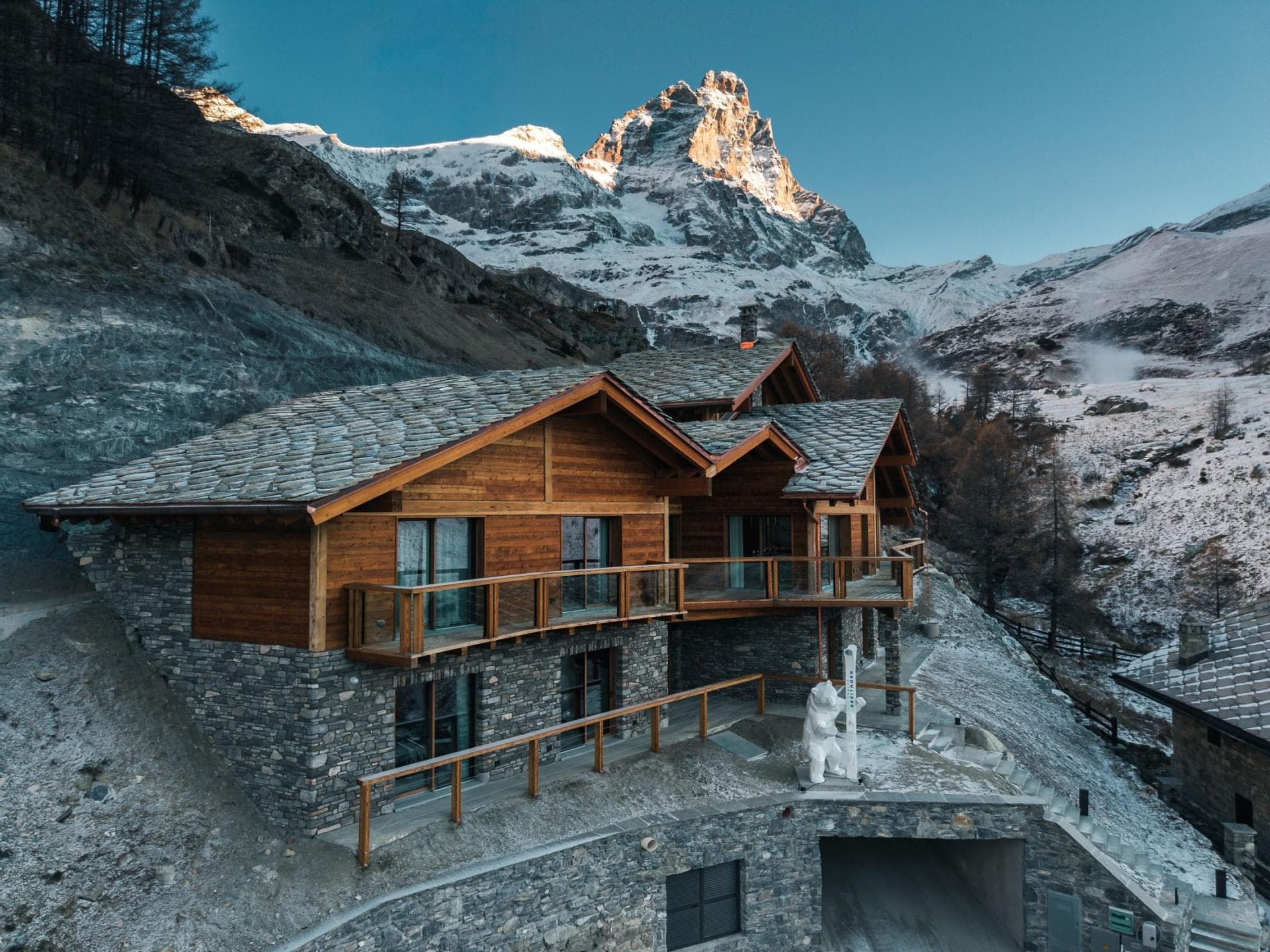 Ski-in/ski-out chalet with stone facade and Matterhorn mountain views