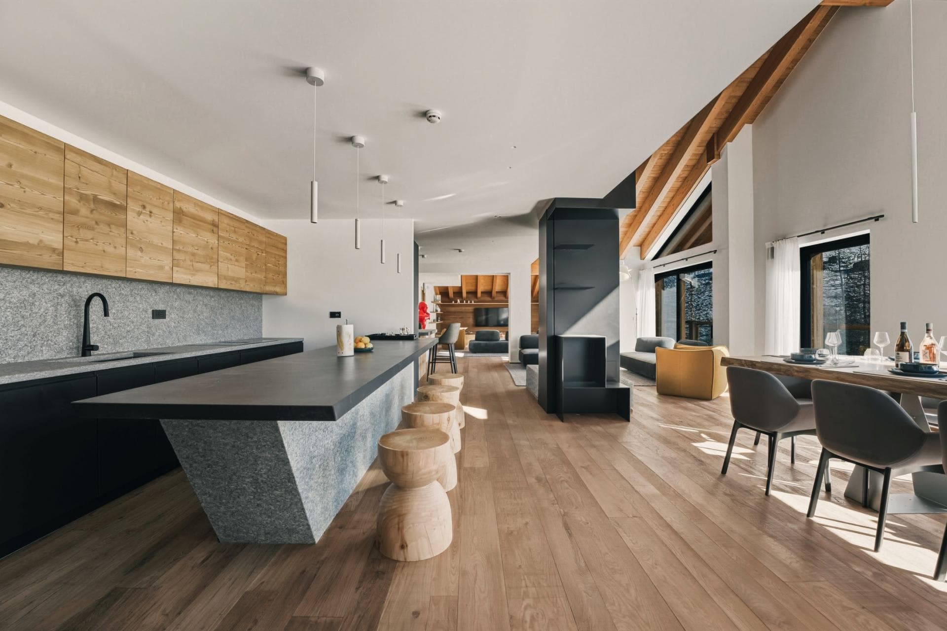 Open-plan kitchen and dining area with 15-foot breakfast bar seating