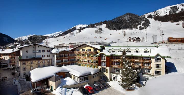 Ski-in/ski-out chalet exterior with direct access to mountain lifts and slopes