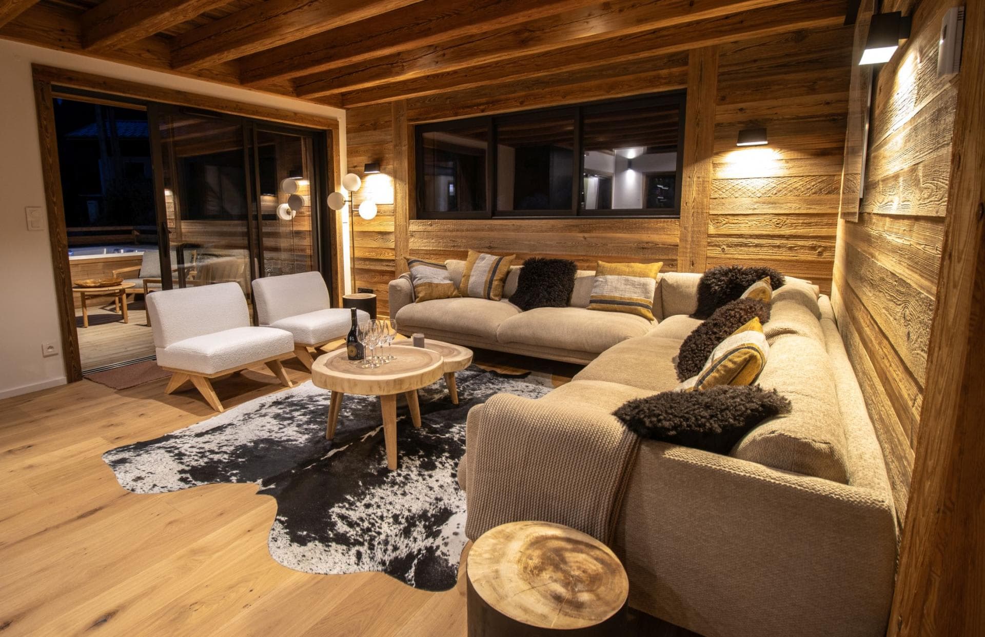 Living area with sectional seating for 8 and deck access