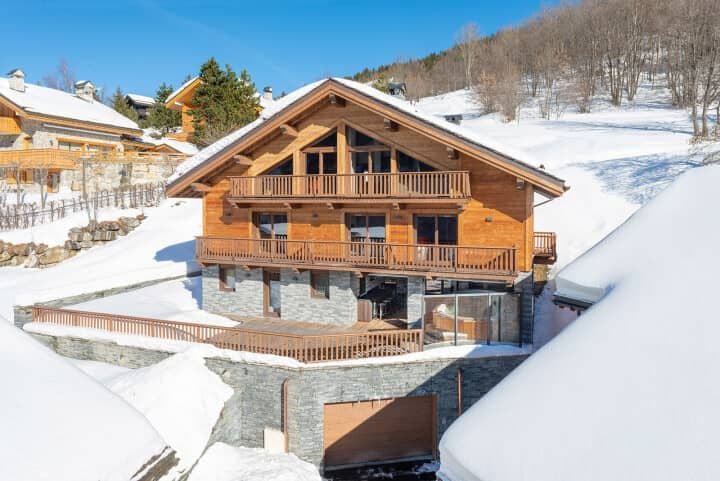 Ski-in/ski-out chalet with heated garage and wrap-around sun decks