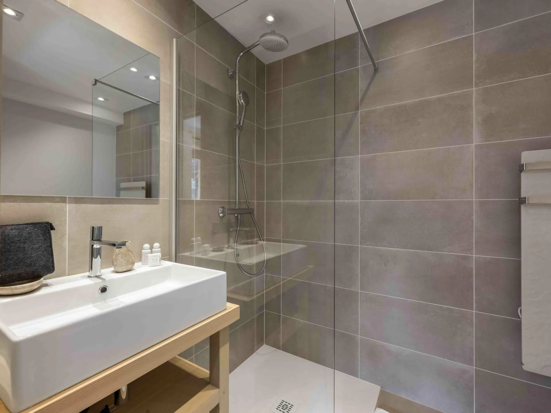 En-suite shower room with a heated towel rail