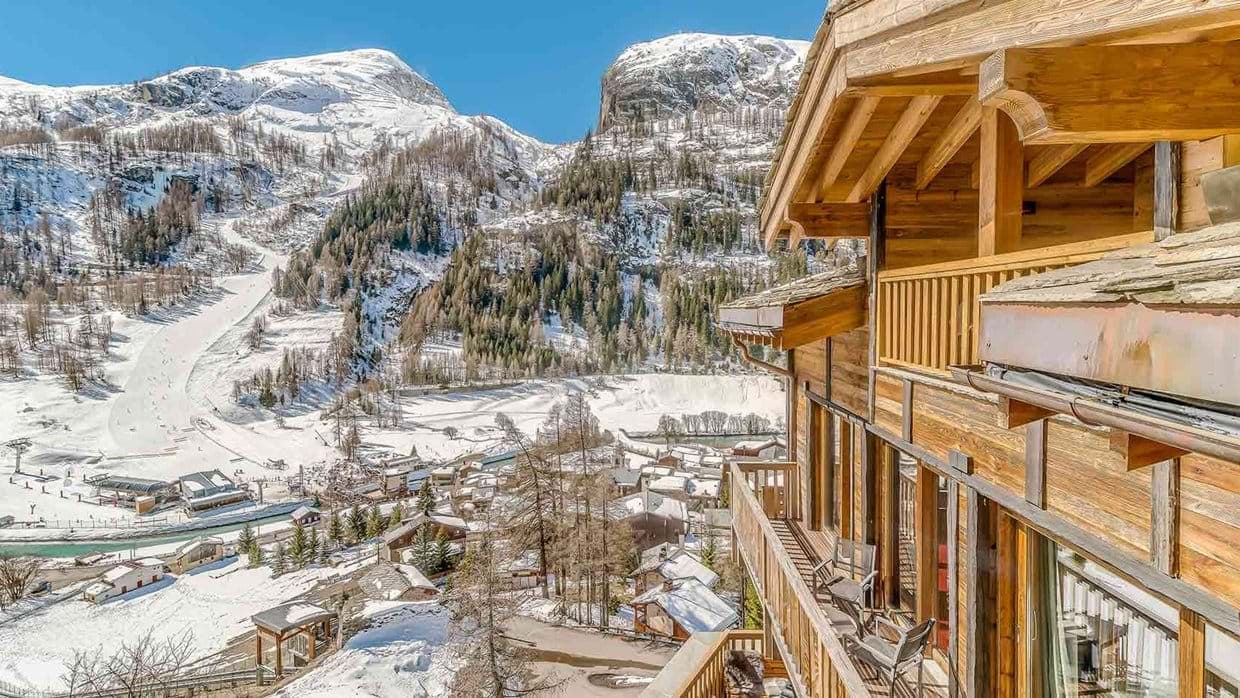 Private balcony overlooking ski slopes and village center