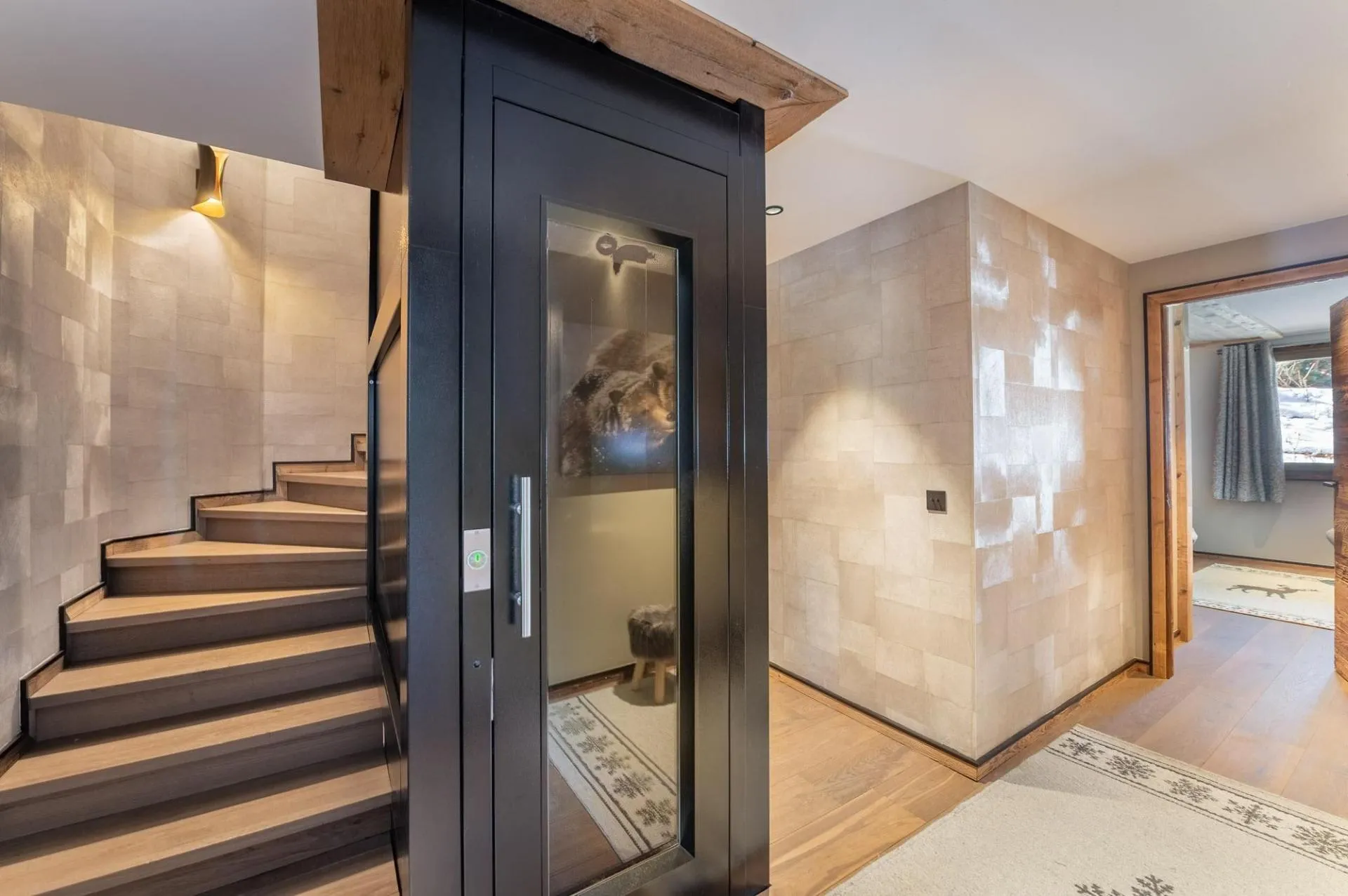 Private lift beside the central staircase