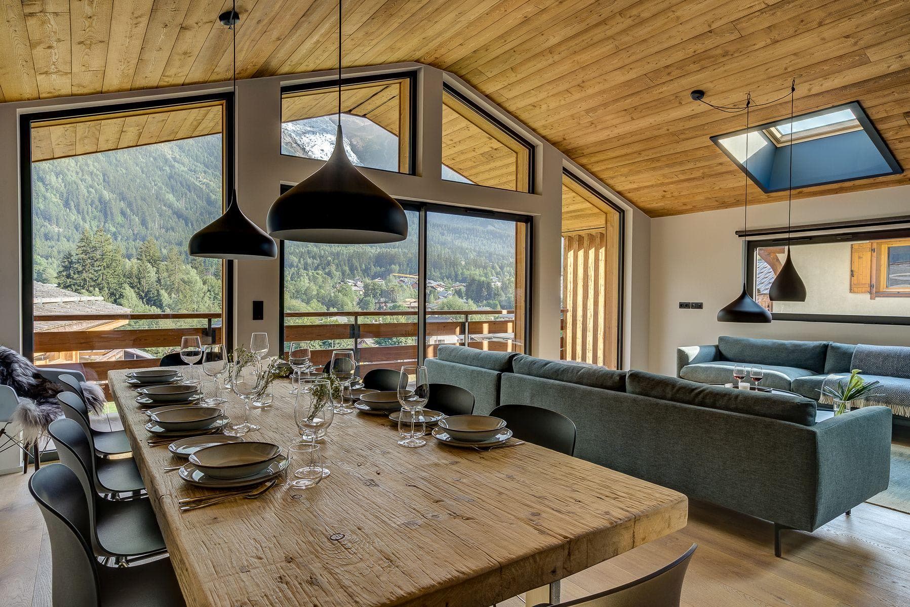 Open-plan dining area with seating for 10 and mountain views
