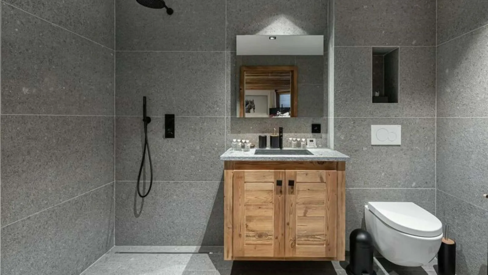En-suite shower room with a walk-in shower and twin basins